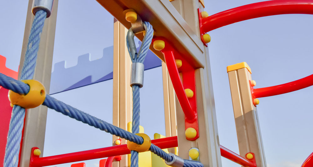 tubes being used on a playground as playground equipment